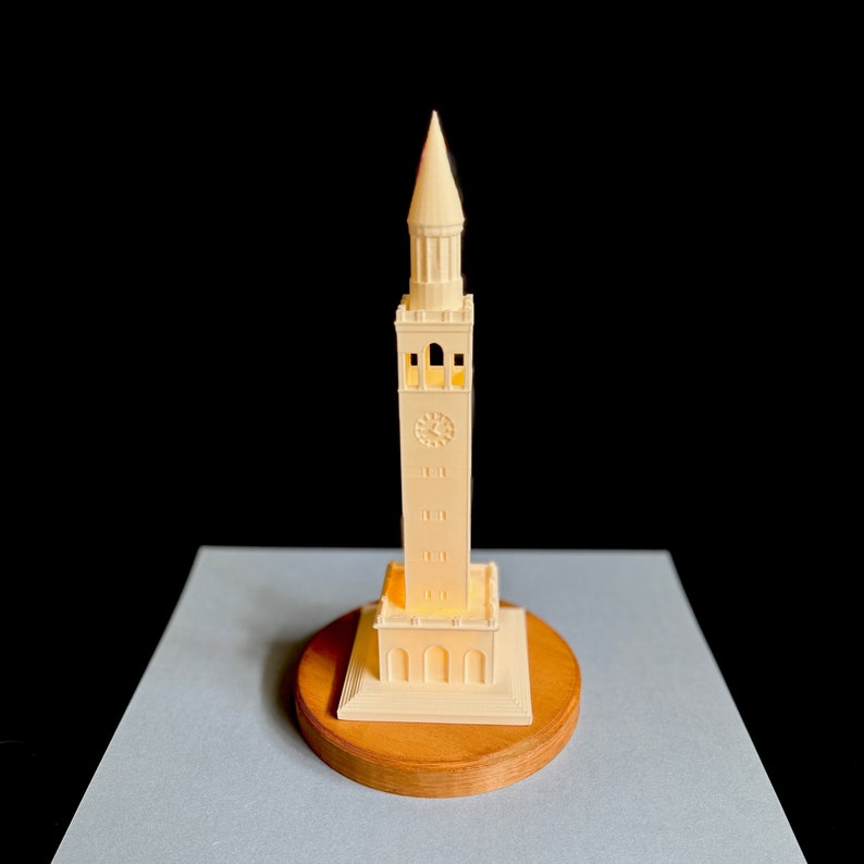 Front view of glowing UNC Bell Tower light, 3D printed graduation gift