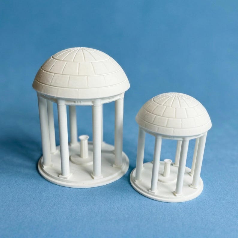 The Old Well figurines, used as gift ideas for UNC alumni and graduates.