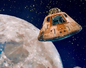 アポロ12号月面着陸記念銘板 - 1969年11月 - 「月への帰還」の説明銘板