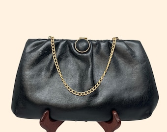 1960s Vintage Black Leather Clutch Purse with Gold Chain Handle and Round Clasp