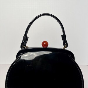 Bolso negro AETN