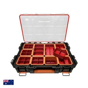 May include: An open black toolbox with orange accents and a clear lid. The toolbox is filled with red and orange plastic organisers.