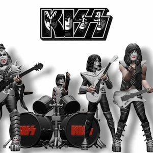 May include: A group of four KISS band figurines in full stage attire, each holding instruments. The band's logo is above them. The figurines are in black, white, and silver, with red accents. The drum set has the KISS logo.