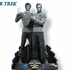May include: A Star Trek: The Wrath of Khan collectible statue featuring Captain Kirk and Khan Noonien Singh. The two figures are standing on a detailed base with the movie title.
