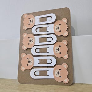 down angled view of 6 pack of brown bear cardstock bookmarks