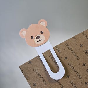 Single brown Bear Bookmark clipped onto display page