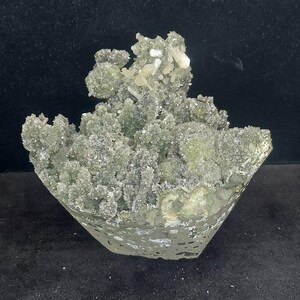 Raw calcite crystal cluster coated in green chalcedony druzy crystals