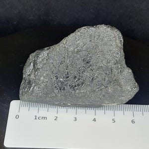 Natural black tourmaline mineral specimen photographed for crystal and stone collection