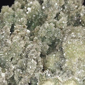 Full view of raw green chalcedony druzy calcite mineral specimen