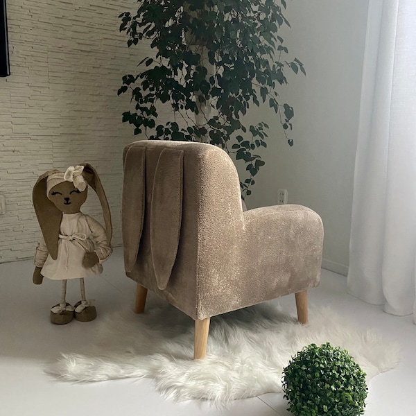 Brown children's armchair with ears and  buttons