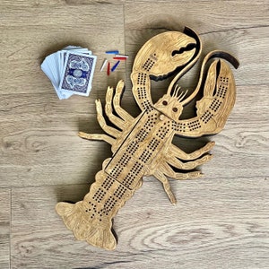 Planche de cribbage Planches de cribbage faites sur mesure avec des animaux de l'océan.