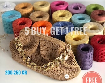 May include: A brown crocheted handbag with a gold chain strap. The bag is surrounded by 30 spools of colorful yarn, with the text "5 BUY, GET 1 FREE" and "FREE SHIPPING" visible.