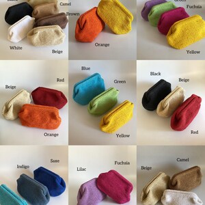 May include: A collection of small, rectangular, crocheted pouches in various solid colors including black, white, beige, brown, orange, yellow, green, fuchsia, red, blue, indigo, saxe, lilac, and camel, each labeled with its respective color name.