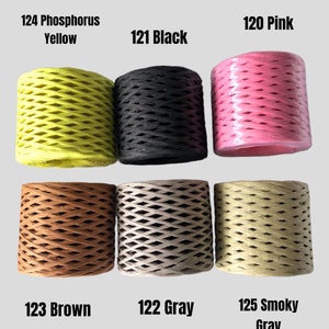 May include: Six spools of paper cord in different colors. The colors are yellow, black, pink, brown, gray, and a light beige. Each spool is labeled with a number and a color name.