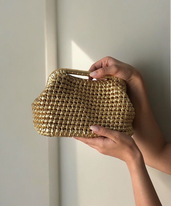 Gold woven clutch bag online