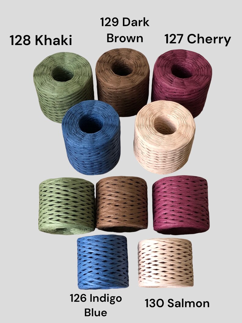 May include: Assortment of 10 spools of paper twine in various colors, including khaki, dark brown, cherry, indigo blue, and salmon. Each spool is labeled with a number and color name.