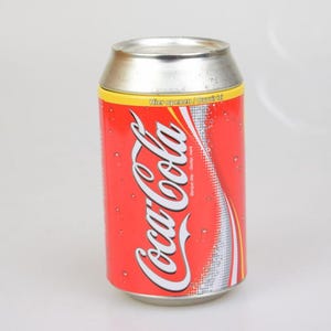 Vintage metal coca cola can piggy bank coin dispenser