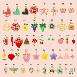 May include: A collection of colorful enamel charms with gold-tone accents. The charms include hearts, bows, flowers, fruits, and other shapes. Measurements are 16mm x 12mm and 11mm x 9mm.