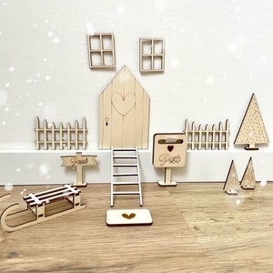 Wooden elf set for a magical Christmas time with the Christmas elf