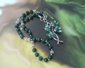 Moss agate necklace with lucky bamboo pendant. Good luck necklace with emerald green moss agate. Trending now brooch bouquet. Drop necklace