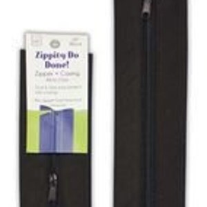 May include: Two black zippered fabric strips with a white label that reads "Zipper Fix It!  Solution for Clothing".