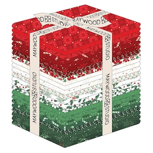 May include: A stack of Christmas-themed fabric squares in red, white, and green, tied with a ribbon that reads "MAYWOOD STUDIO". The fabric features patterns of snowflakes, candy canes, and holly.