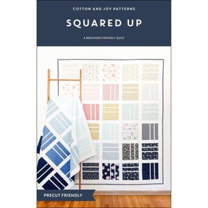 May include: A quilt pattern titled "Squared Up" with a navy blue header. The quilt features a grid design with various fabric patterns and colors, including floral, stripes, and solid blocks. A quilt with a blue and white geometric pattern is draped over a wooden ladder.
