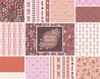 May include: A collection of floral and patterned fabric swatches in shades of pink, brown, and cream. The designs include flowers, stripes, and geometric shapes. The center swatch features the text "COTTAGE BLOOMS".