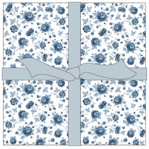 May include: A square gift box wrapped in white paper with a blue floral pattern. The box is tied with a light blue ribbon and bow, creating a classic and elegant presentation.