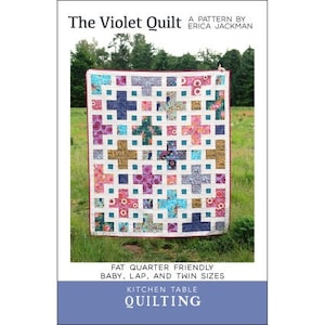 May include: A quilting pattern for a quilt called "The Violet Quilt" by Erica Jackman. The quilt is made with fat quarters and is available in baby, lap, and twin sizes. The quilt is a patchwork of colorful squares and crosses.