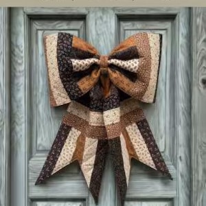 May include: A quilted fabric bow featuring a patchwork design of brown, tan, and cream floral patterns. The text reads: THE BIG GIANT QUILTED JELLY ROLL BOW, Made to be reversible, Designed for 2.5" strips, 2 style options included, A beginner-friendly sewing pattern + video tutorial by: LGC LINDSEY GRACE CREATED.