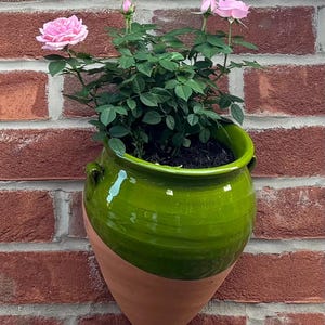 Spanish pottery handpainted wall plant pot. Colourful green hanging garden pot