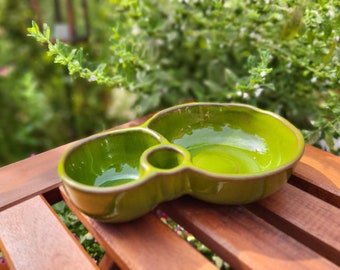 Spanish pottery green olive bowl with space for stones and sticks