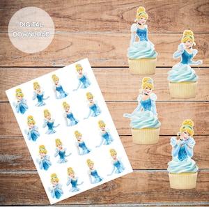 Puede incluir: Una hoja de pegatinas de Cenicienta y cupcakes con adornos de Cenicienta sobre una superficie de madera. Las pegatinas y adornos presentan a Cenicienta con un vestido azul. Las magdalenas tienen glaseado azul. Las palabras "DESCARGA DIGITAL" están en un círculo en la esquina superior izquierda.