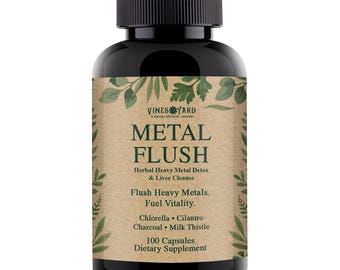 May include: A black bottle of "Metal Flush" capsules. The label is tan with green leaf accents and text that reads "Herbal Heavy Metal Detox & Liver Cleanse." It lists ingredients like Chlorella and Milk Thistle. 100 capsules.