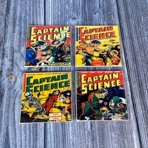May include: Four vintage comic book covers featuring Captain Science. The covers are yellow, red, blue, and green with illustrations of a man in a spacesuit, a man with a sword, a skeleton, and a man in a green suit.