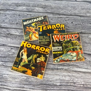 May include: Four vintage horror comic books with colorful covers featuring monsters, ghouls, and scary scenes. The titles are "Nightmare", "Terror Tales", "Horror Stories", and "Weird".