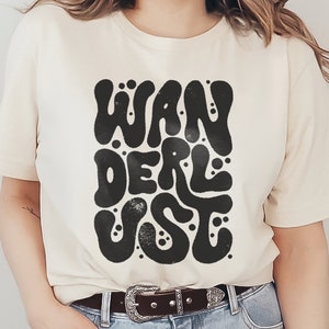 Wanderlust Graphic T-Shirt Boho Hippie Travel Retro Vintage Lettering and Typography Phrase and Saying Unisex Men's Women's Tee