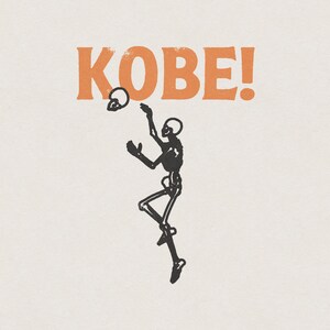 May include: A black skeleton figure with outstretched arms, jumping up to catch a basketball. The word "KOBE!" is printed in orange above the figure.