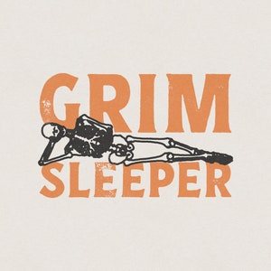 May include: A graphic design with the text "GRIM  SLEEPER" in orange letters with a distressed look. A black skeleton is lying down with its arms outstretched.
