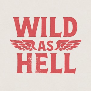 May include: Red graphic print with the text "WILD AS HELL" with stylized wings on either side of the word "AS".
