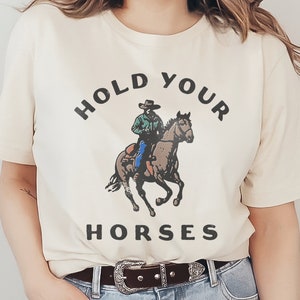 Hold Your Horses Graphic T-Shirt Funny & Humorous Country Southern Western Cowboy Phrase and Saying Vintage Unisex Men's Women's Tee