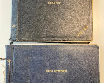 Two Albums of signatures of the Moss Bros Warehouses, London
