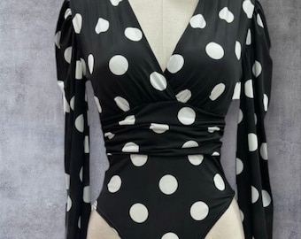 Flamenco Lycra bodysuit with push-up padding. Black with white polka dots. New.