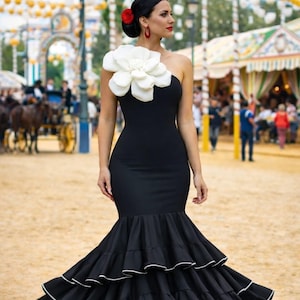 Flamenco bodysuit with push-up padding. Black with a large white flower. New.