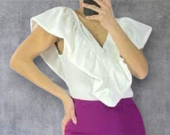Flamenco top with a large ruffle on the chest and back. Large V-neck. Various colors. New.