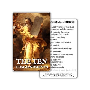 May include: A religious card with a painting of God holding the Ten Commandments. The text on the card reads "The Ten Commandments" and includes the text of the Ten Commandments.