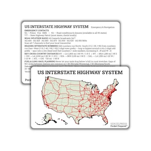 May include: Two white pocket cards with the text "US Interstate Highway System" and a map of the United States with red interstate routes. The cards include emergency contact information and cross-country distances.