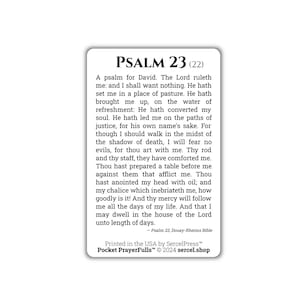 May include: A white rectangular card with rounded corners features the text "PSALM 23 (22)" at the top, followed by a passage from Psalm 23. The card includes the text "Printed in the USA by SercelPress™ Pocket PrayerFulls™ © 2024 sercel.shop."
