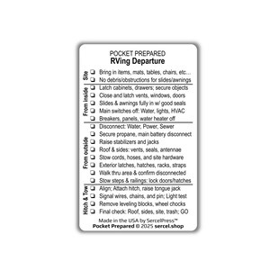 May include: A white rectangular checklist titled "POCKET PREPARED RVing Departure" with black text. The checklist includes items to bring, secure, and disconnect before departing. The checklist is made in the USA by SercelPress.